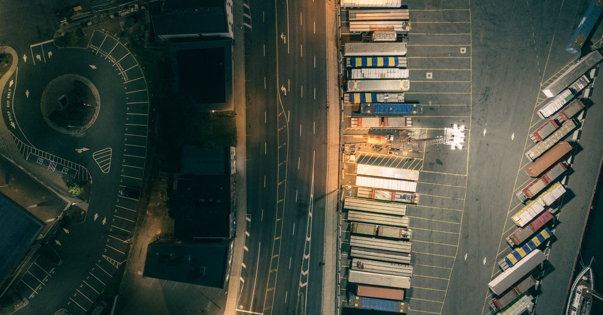 In Container Camera Shot Drone Shot of Cargo Containers on a Parking Lot · Free Stock Photo