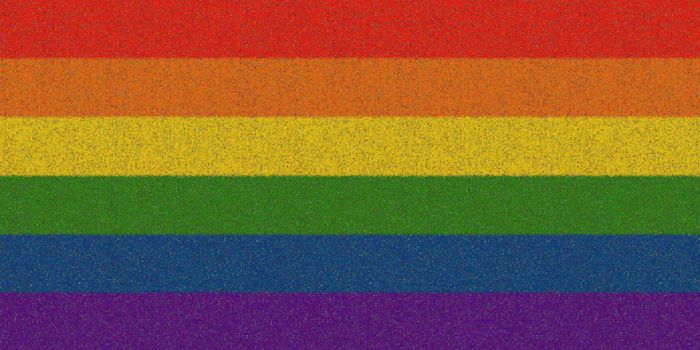 Vibrant rainbow stripe pattern symbolizes LGBTQ pride with a textured effect.