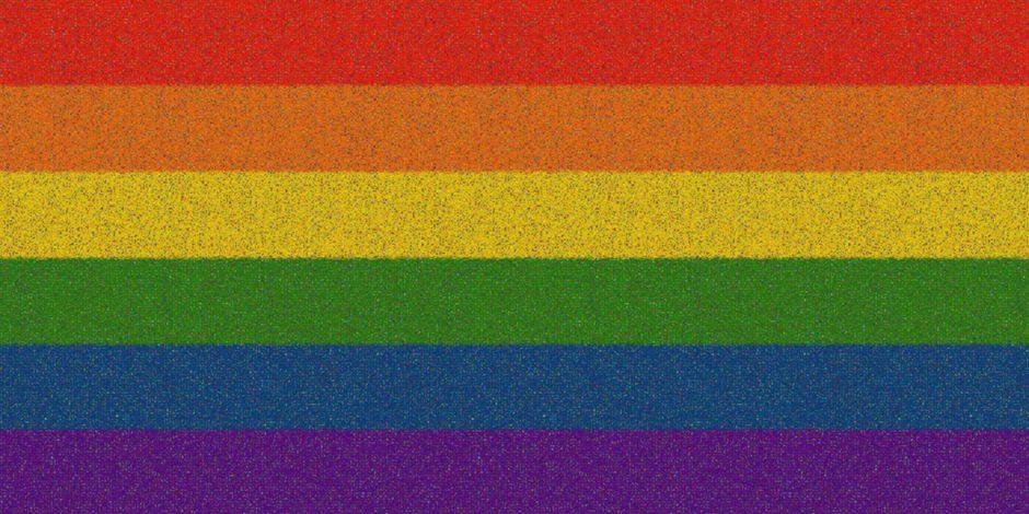 Vibrant rainbow stripe pattern symbolizes LGBTQ pride with a textured effect.