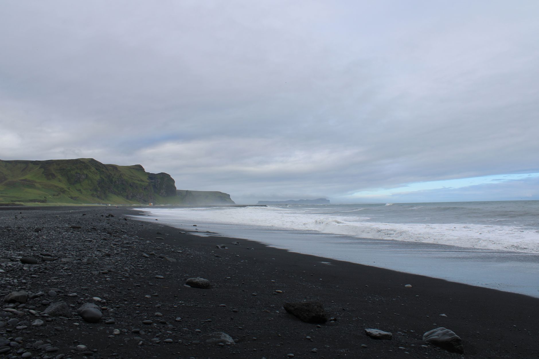 Discover the unique beauty of Iceland's black sand beaches with dramatic coastal views and moody skies.. pexels, discover, un