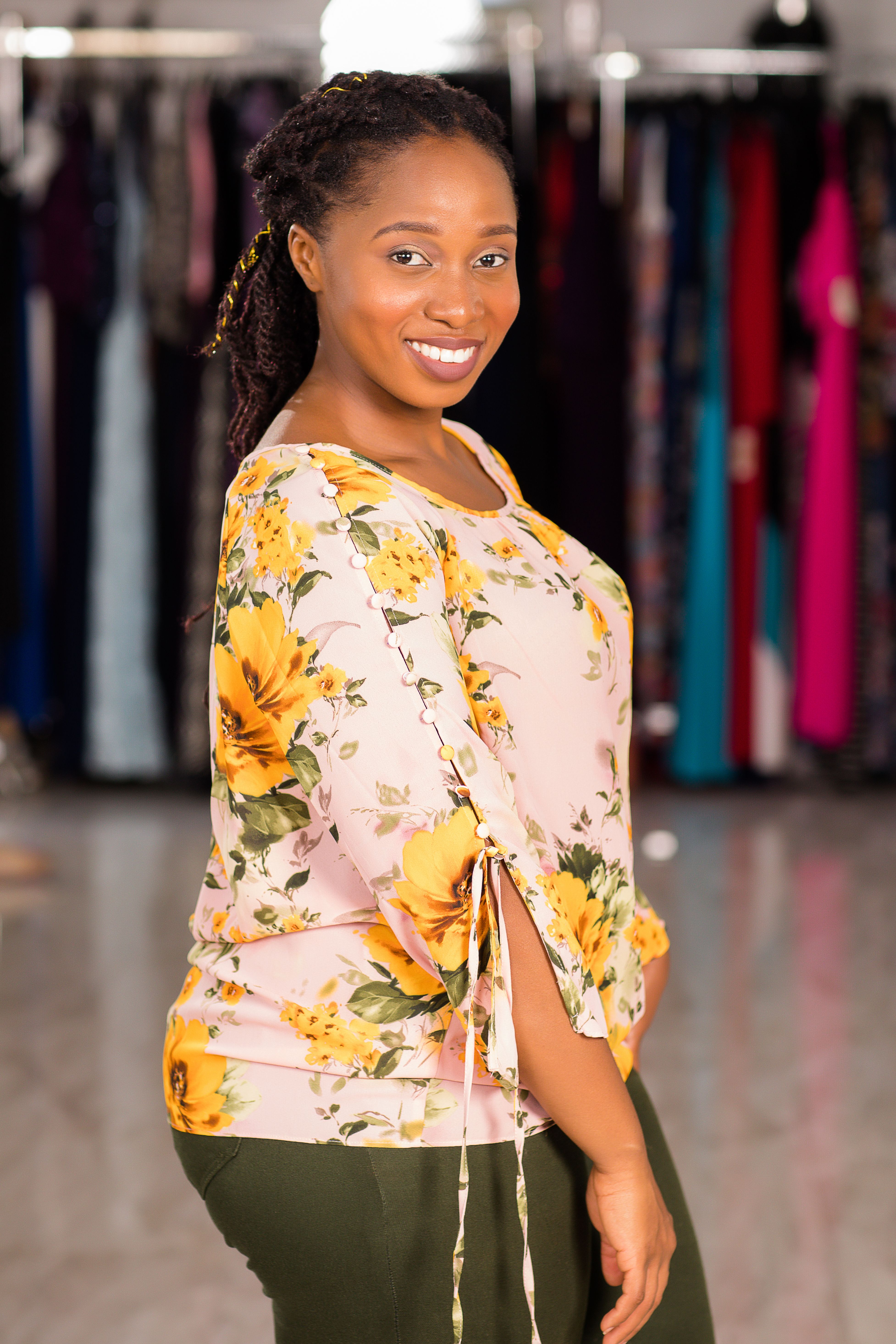 Photo of a Woman Wearing Floral Top · Free Stock Photo
