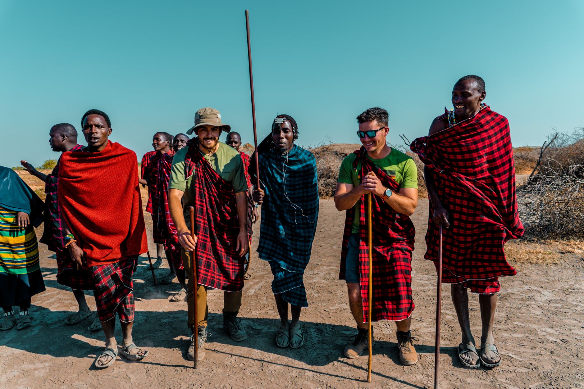 Group of men in traditional Maasai attire in the Arusha Region, Tanzania, embodying cultural heritage.