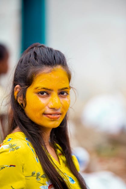 Woman With Yellow Paint On The Face · Free Stock Photo