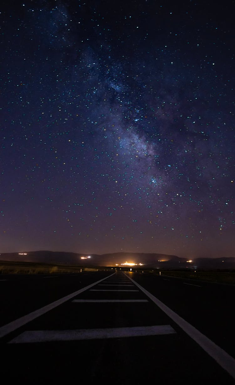 Road Under Starry Night Sky