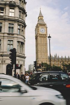 Captivating view of Big Ben towering over a bustling London street scene.