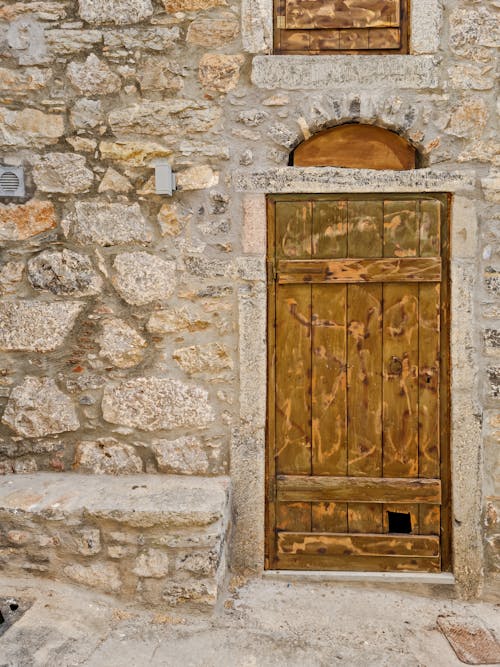 Gratis stockfoto met binnenkomst, deuropening, houten deur
