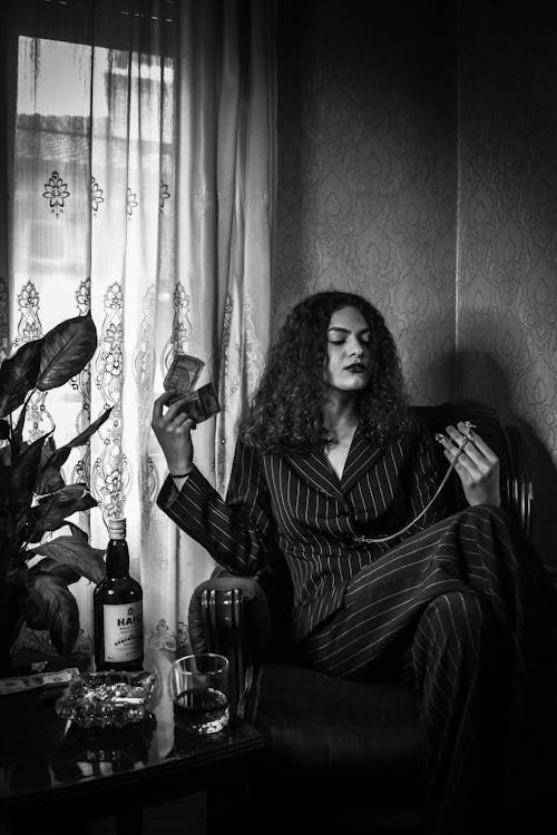 Woman Posing on Armchair in Black and White