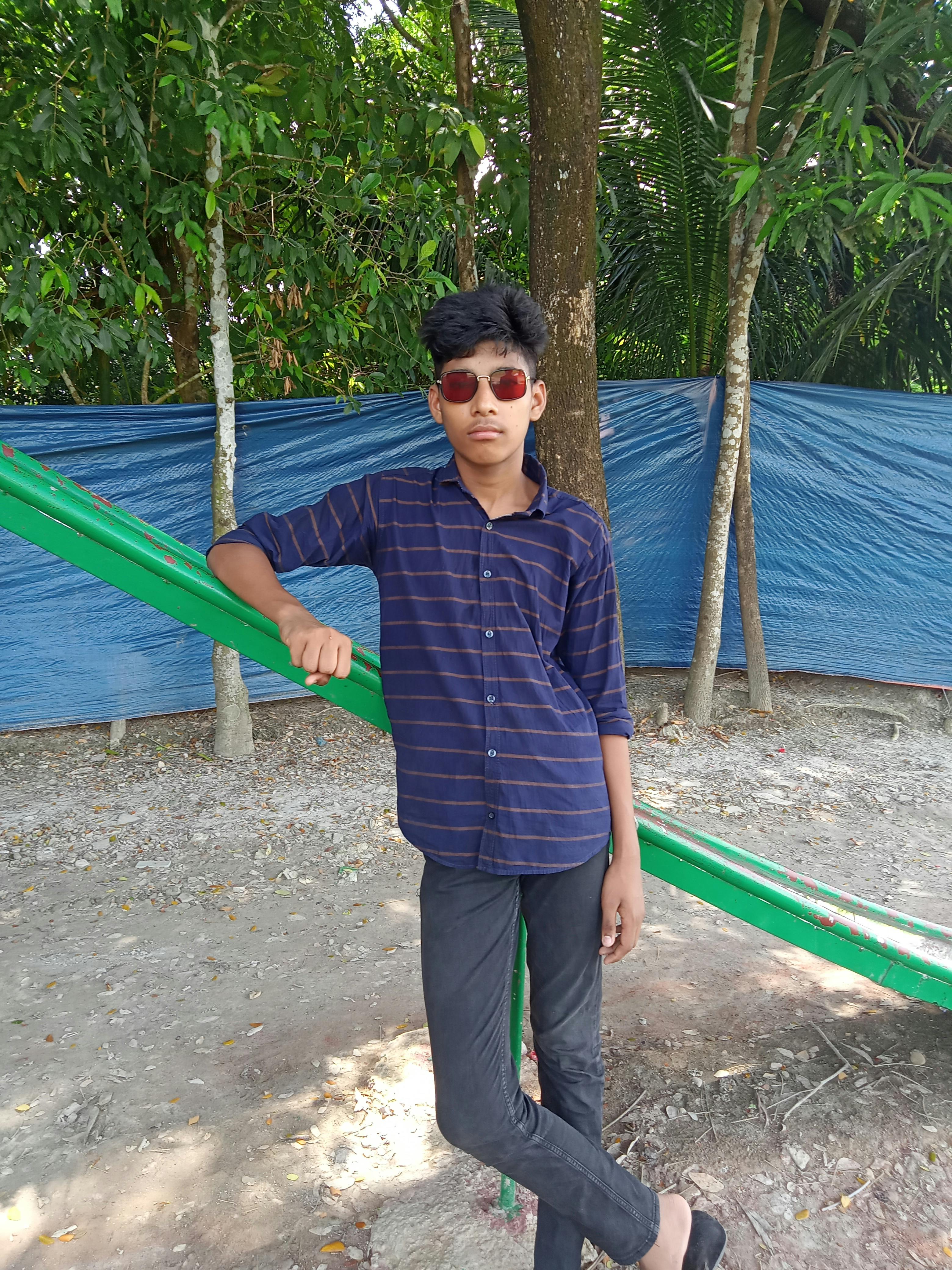 Person wearing a modern mixed reality or VR headset in a dimly lit environment