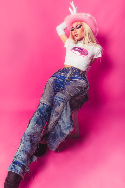 Woman Posing on Pink Background