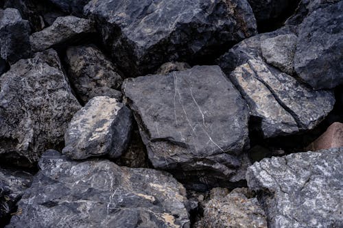 Pile of Black Rough Rocks