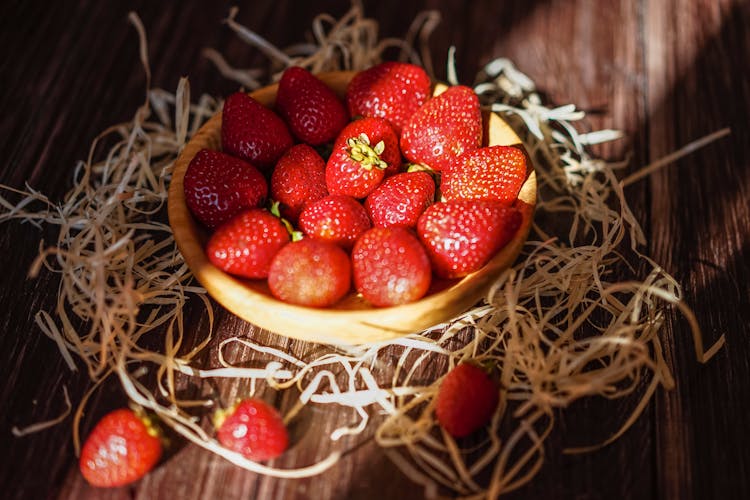 Strawberries On Brown Woven Basket