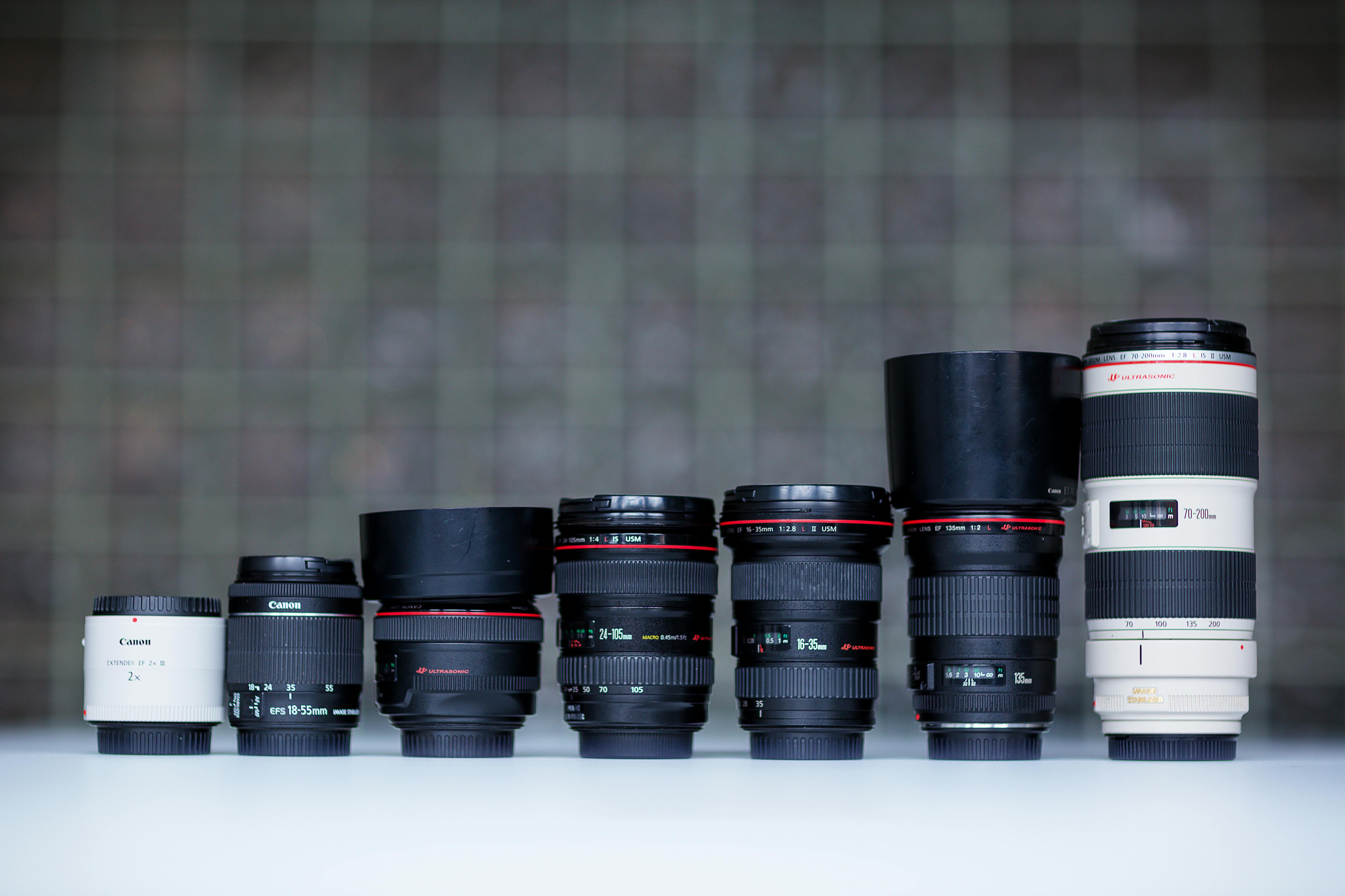 CloseUp Shot of Camera Lens on White Surface · Free Stock Photo