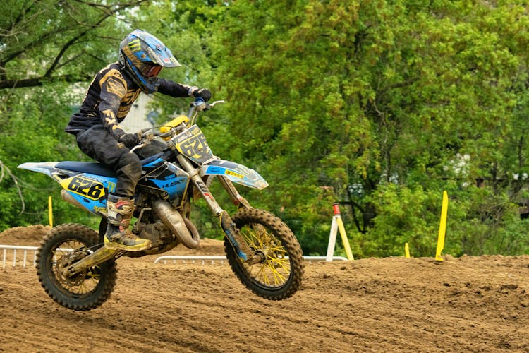 Man Riding Motocross Motorcycle