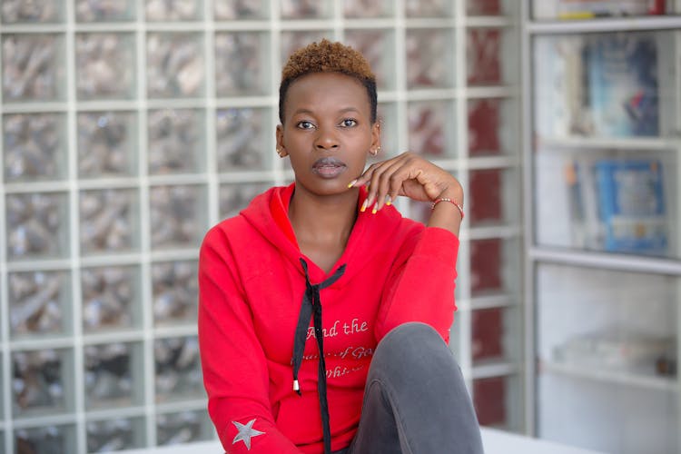 A Woman In Red Hoodie