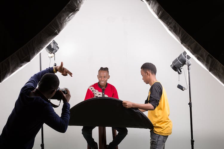 Men Taking Photos In A Studio