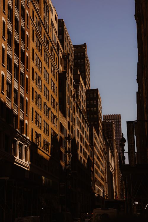 Free A dramatic view of high-rise buildings showcasing urban architecture against a clear sky. Stock Photo