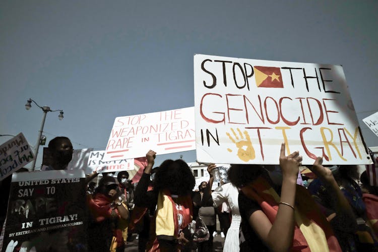 Group Of People Protesting In The Street