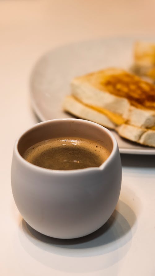 White Ceramic Cup With Coffee