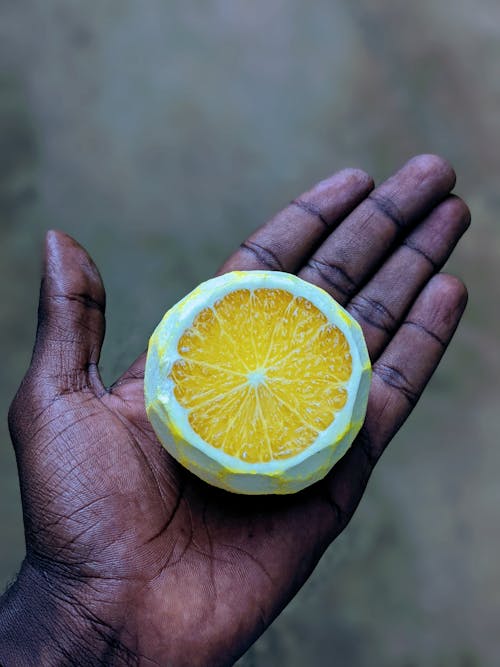 Free Person Holding Sliced Orange Fruit Stock Photo