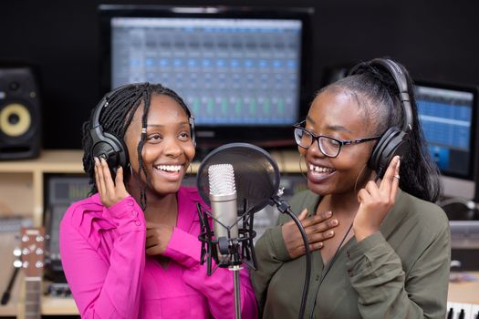 Women Recording Music at a Music Studio