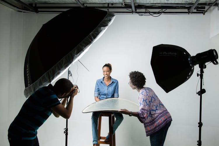 Woman On A Professional Photoshoot In Studio