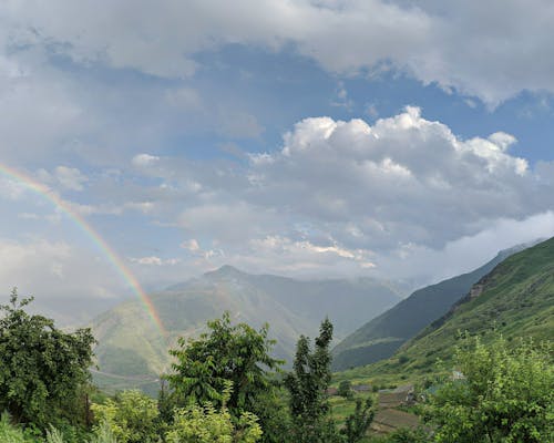 Fotos de stock gratuitas de arco iris, cerros, escénico