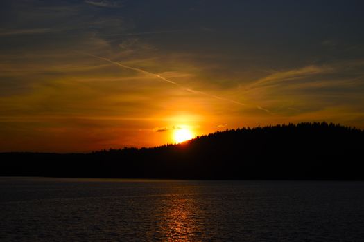 A stunning sunset over the ocean capturing vibrant colors and peaceful waters.