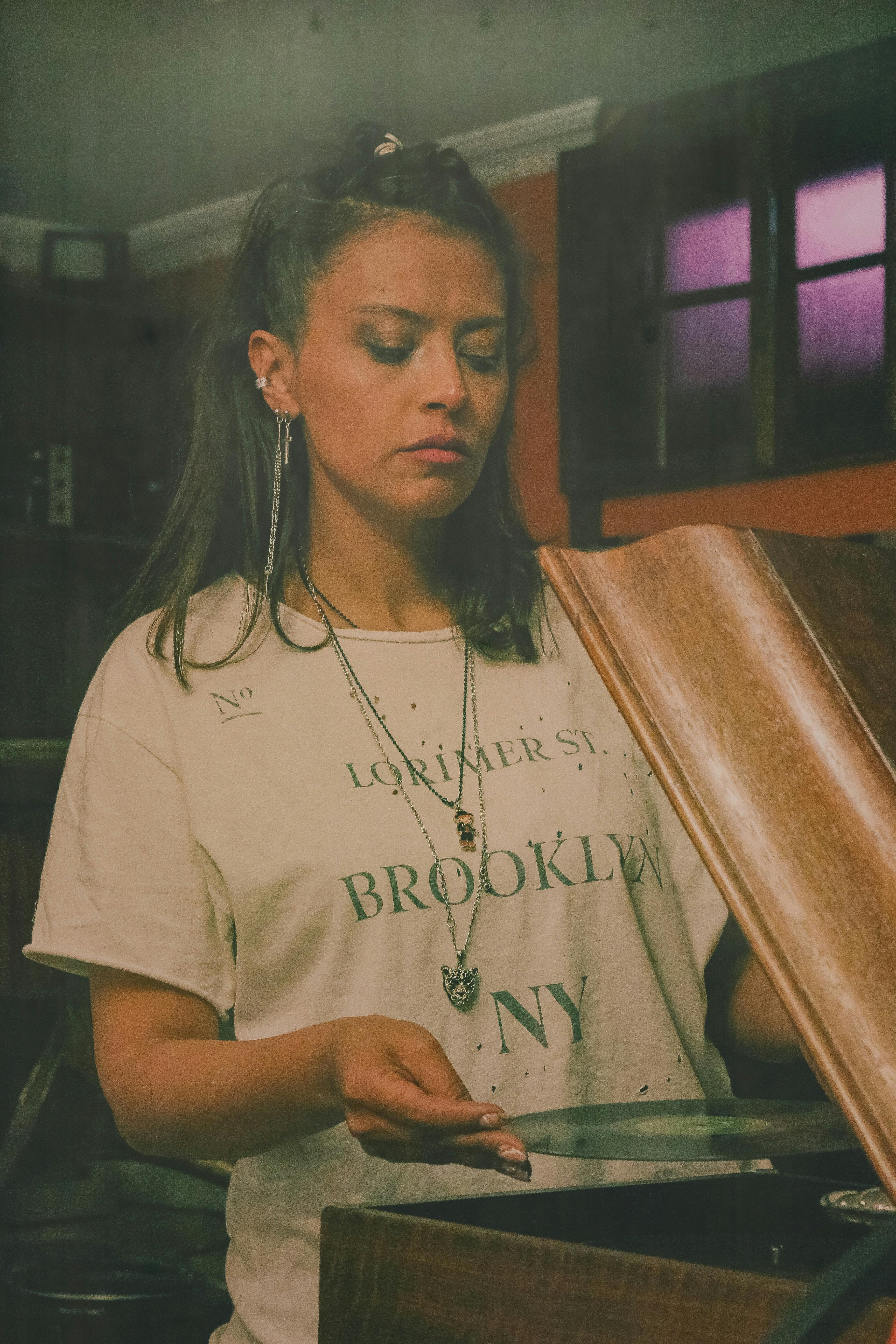 a woman in white crew neck t shirt