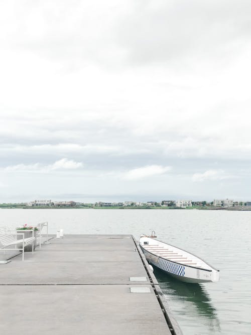 Boat at Empty Pier on Sea