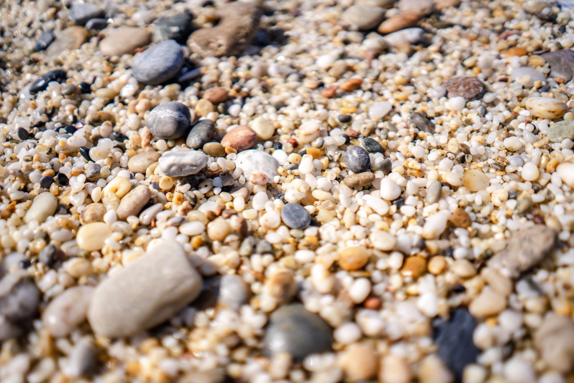 Close Up of Stones and Rocks on Beach · Free Stock Photo