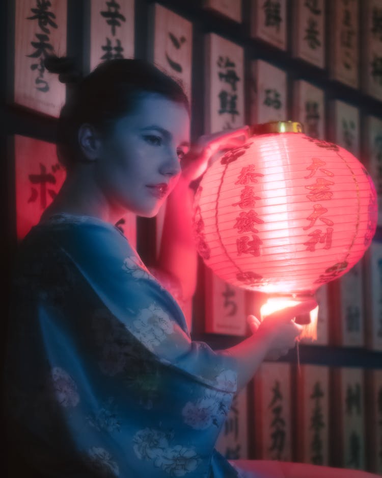 Woman Wearing Kimono Holding Red Lantern With Japanese Script