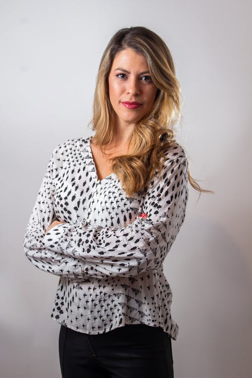 Woman Wearing Long Sleeve Top with Arms Crossed