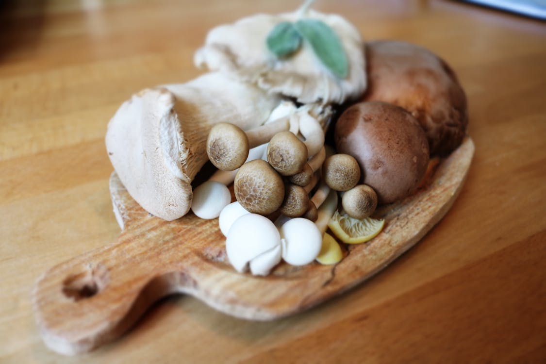 Mushroom on Brown Wooden Plate