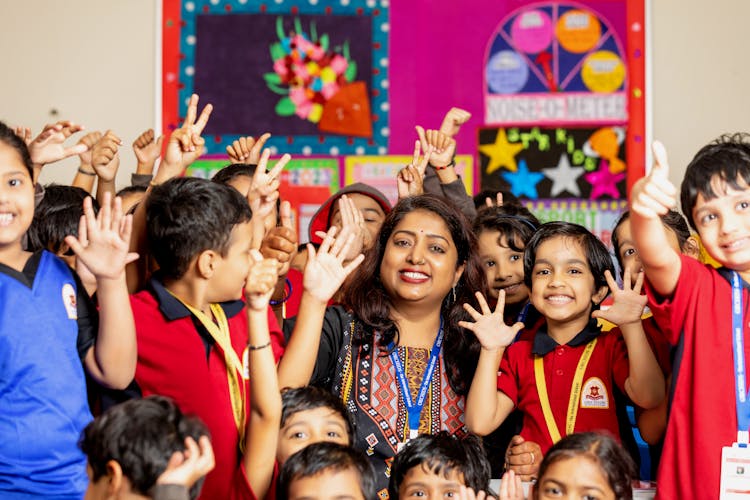 Group Of Children Making Peace Sign