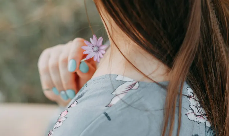 Pastel-colored press-on nails with floral patterns