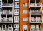 Photography of Orange and Gray Building