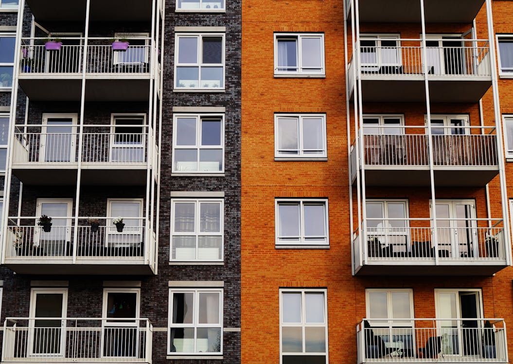 Free Photography Of Orange And Gray Building Stock Photo