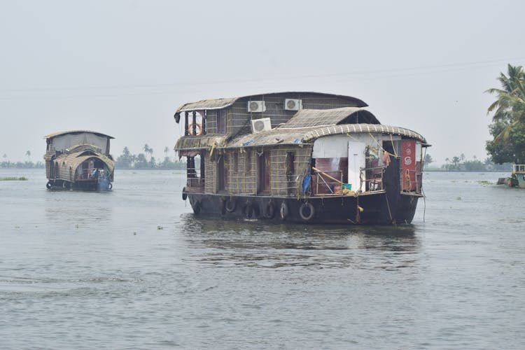 Houseboats In A Canal In Kerala, India