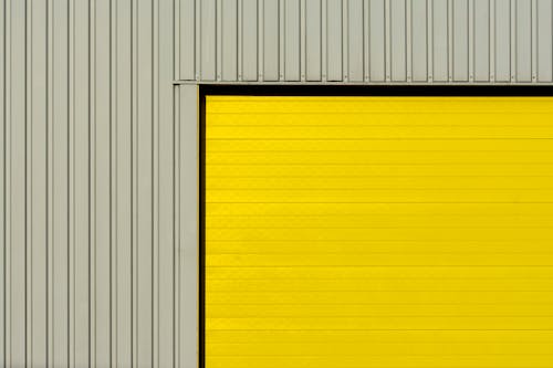 Free Photo of a Yellow Square on a Grey Background Stock Photo