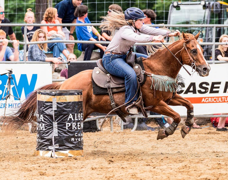 Female Cowboy During A Rodeo Event