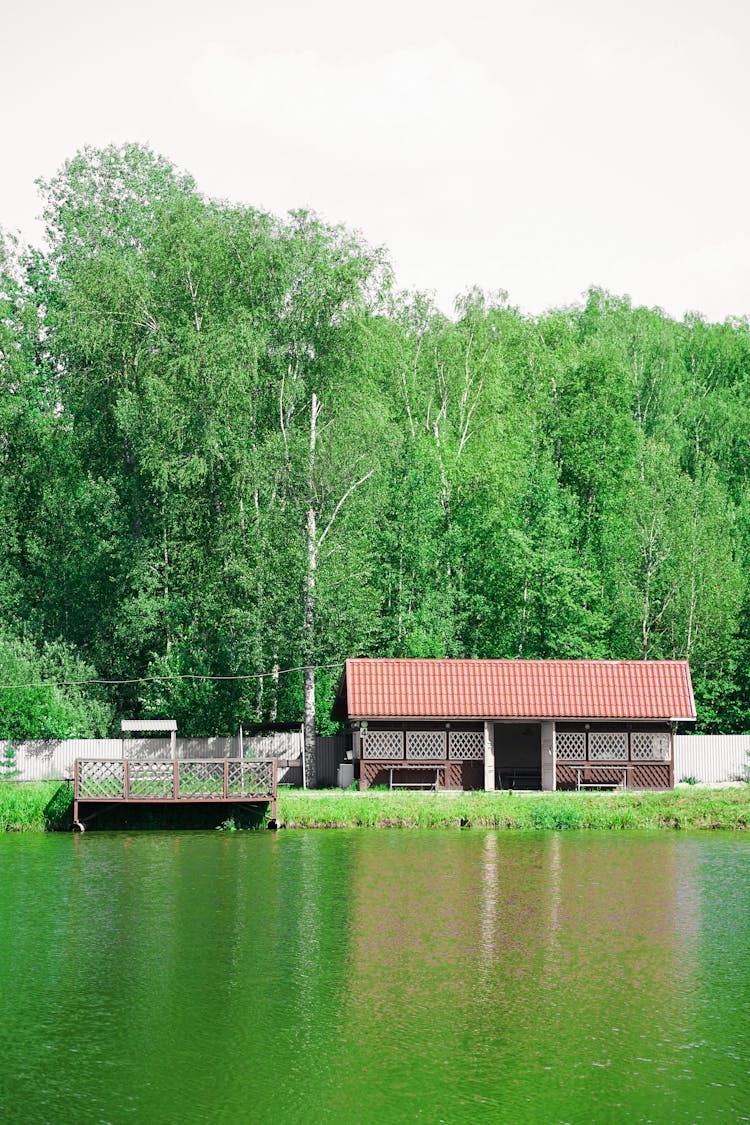 Wooden Shelter On The Riverbank