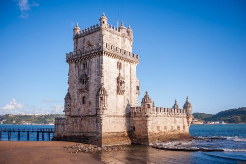 Free Capture of the iconic Belém Tower in Lisbon, a testament to Portugal's maritime heritage. Stock Photo