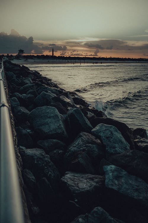 Photo of a Rock Seashore and Sea