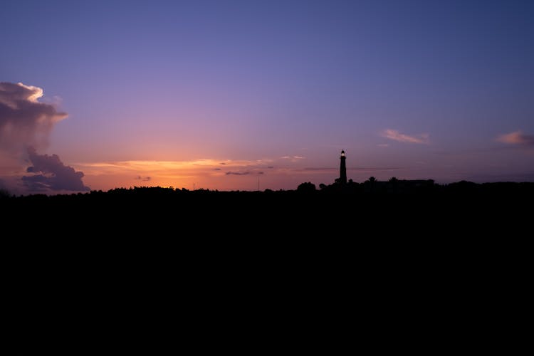 Silhouette Of Landscape On Sunset