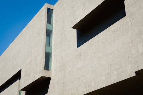 Modern Geometric Building on Blue Sky