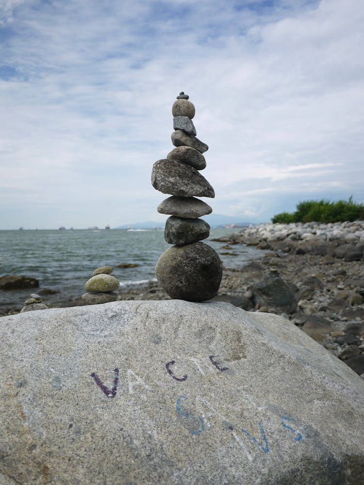 Stacked Stones On A Boulder