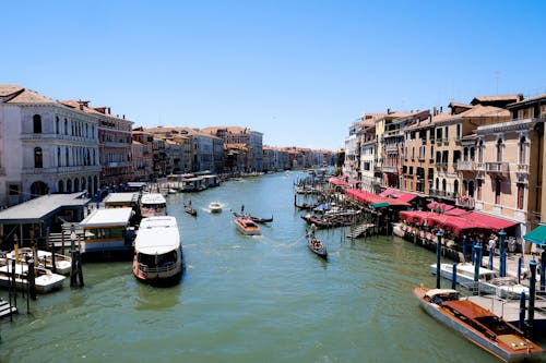 Boats on Water Near Buildings