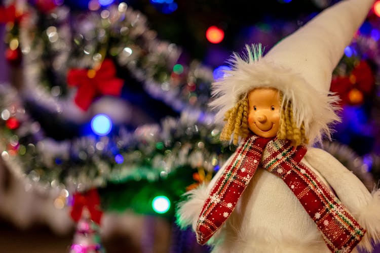 Snow Maiden Toy Under Christmas Tree