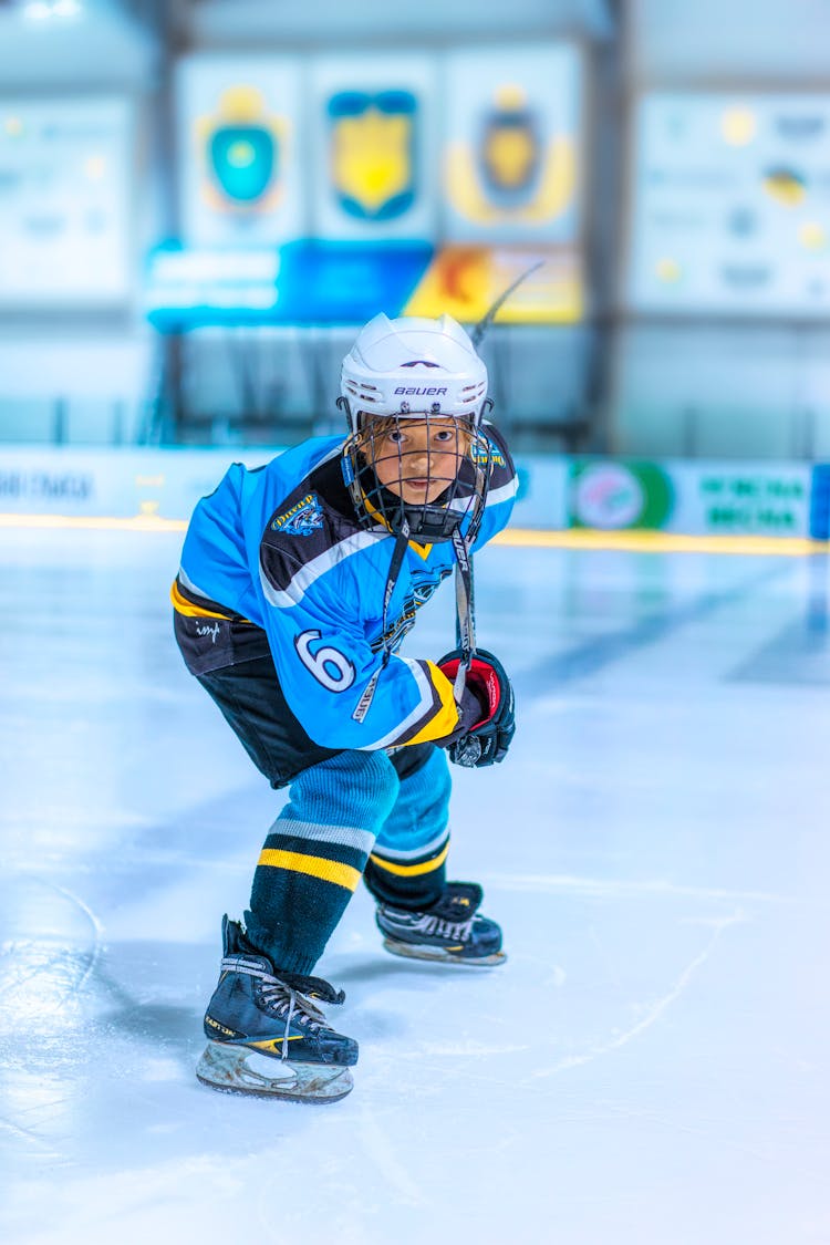 A Boy Playing Ice Hockey