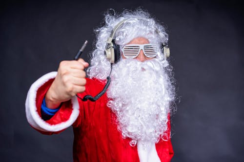 Santa Claus Wearing a Headphone